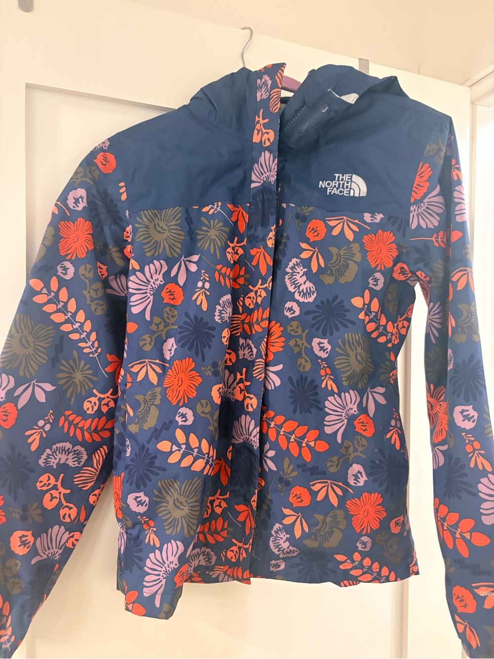 The North Face Navy Floral Hooded Rain Jacket with Orange & Pink Accents
